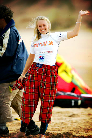 annalise stood on the beach waving